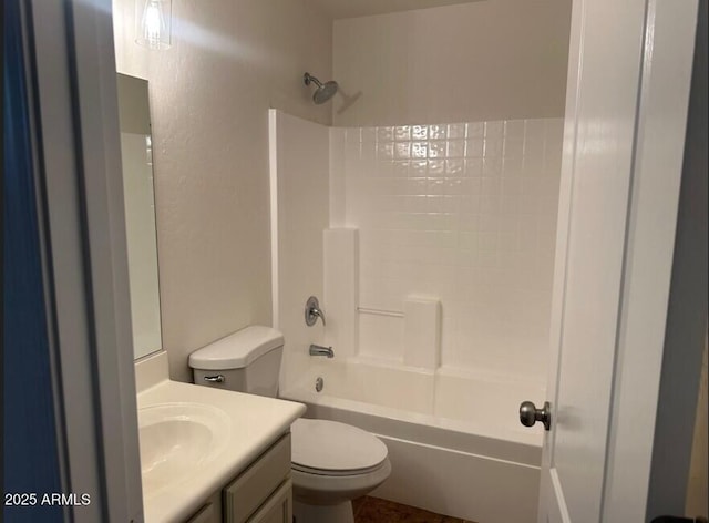 full bathroom featuring toilet, vanity, and shower / washtub combination