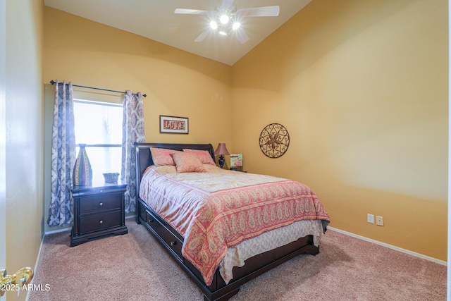 carpeted bedroom with a ceiling fan, baseboards, and vaulted ceiling