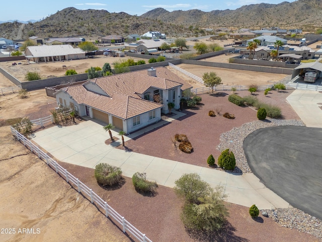 drone / aerial view featuring a mountain view