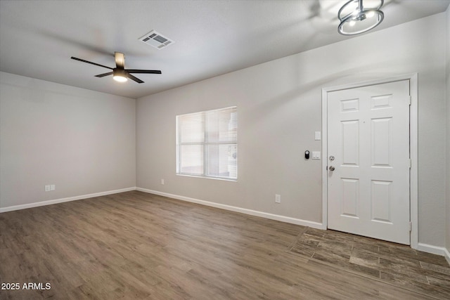 10551 W Jessie Ln, Peoria, AZ 85383 - foyer entrance with baseboards, visible vents, wood finished floors, and a ceiling fan