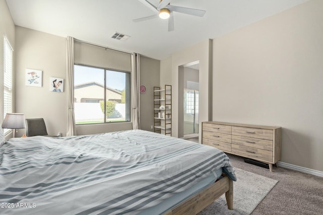 bedroom with ceiling fan and carpet floors