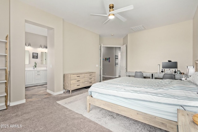 carpeted bedroom with ensuite bathroom