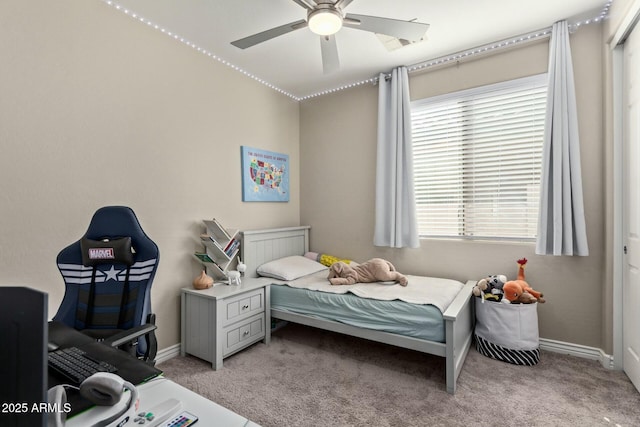 bedroom with ceiling fan and light colored carpet