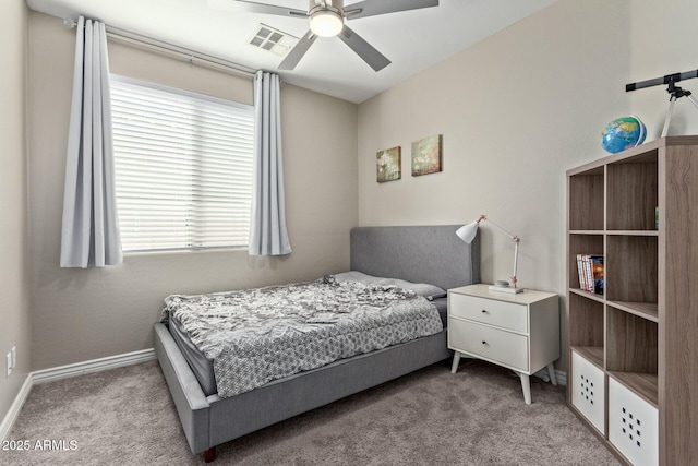 bedroom featuring ceiling fan and light colored carpet