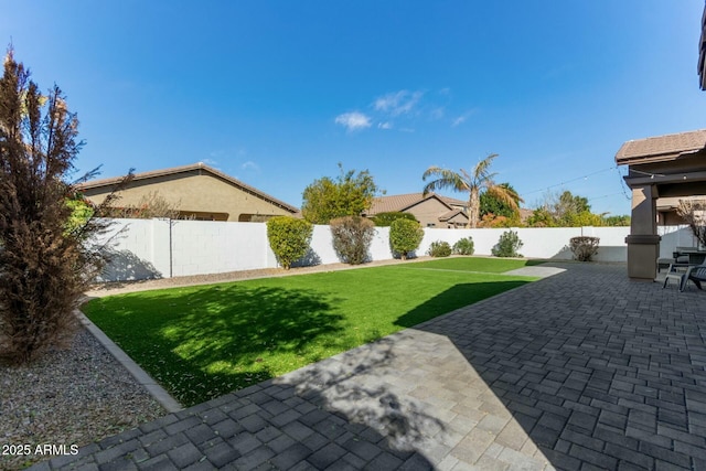 view of yard with a patio area