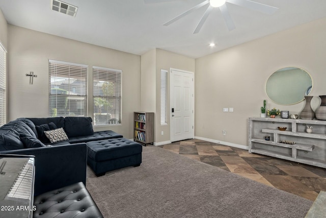 living room featuring ceiling fan