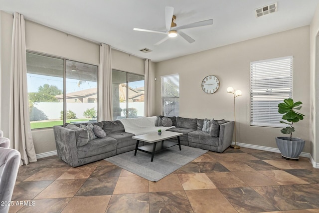 living room featuring ceiling fan