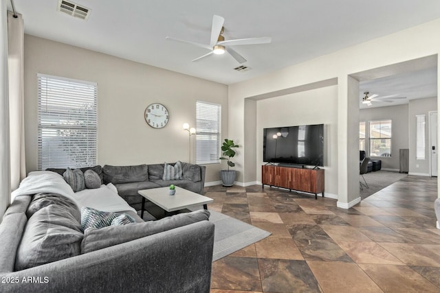 living room featuring ceiling fan