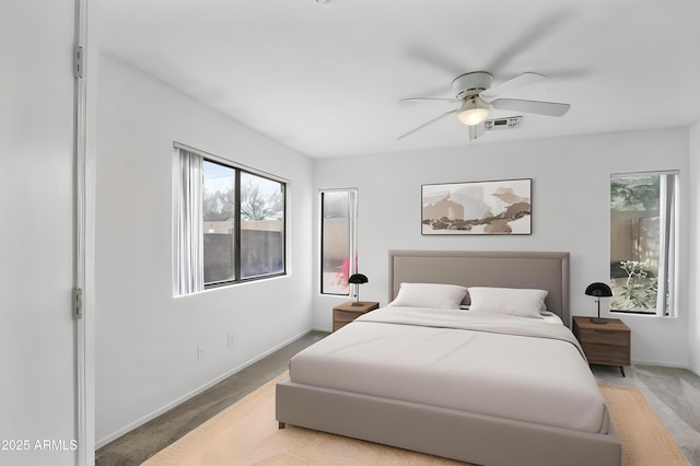 6410 W Winslow Ave, Phoenix, AZ 85043 - bedroom featuring light carpet, baseboards, and ceiling fan