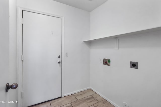 6410 W Winslow Ave, Phoenix, AZ 85043 - laundry area featuring washer hookup, hookup for an electric dryer, baseboards, wood tiled floors, and hookup for a gas dryer