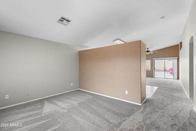 6410 W Winslow Ave, Phoenix, AZ 85043 - unfurnished room featuring carpet flooring, a ceiling fan, lofted ceiling, and baseboards
