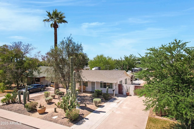 1940 E Indianola Ave E, Phoenix, AZ 85016 - view of front of house with driveway, roof with shingles, and a gate