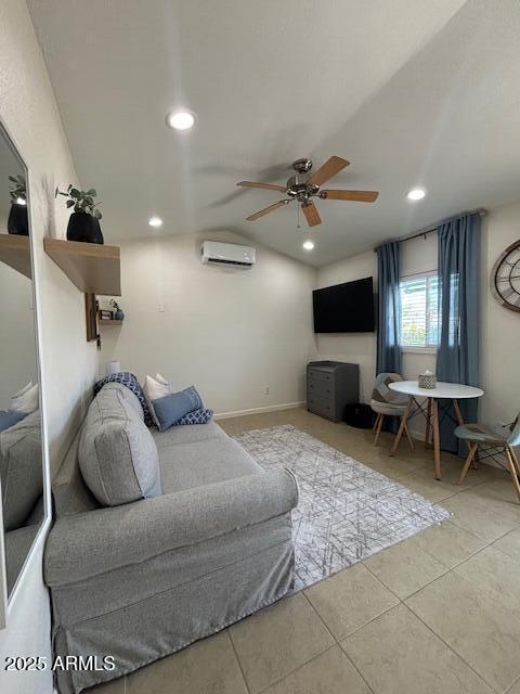 1940 E Indianola Ave E, Phoenix, AZ 85016 - tiled living area featuring a wall mounted air conditioner, ceiling fan, recessed lighting, and vaulted ceiling