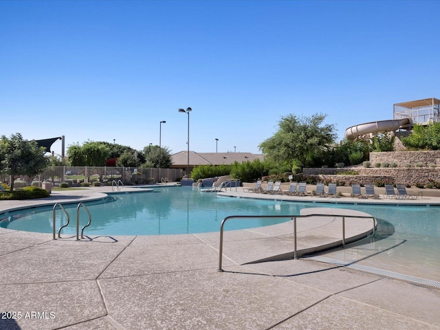 view of swimming pool featuring a patio area