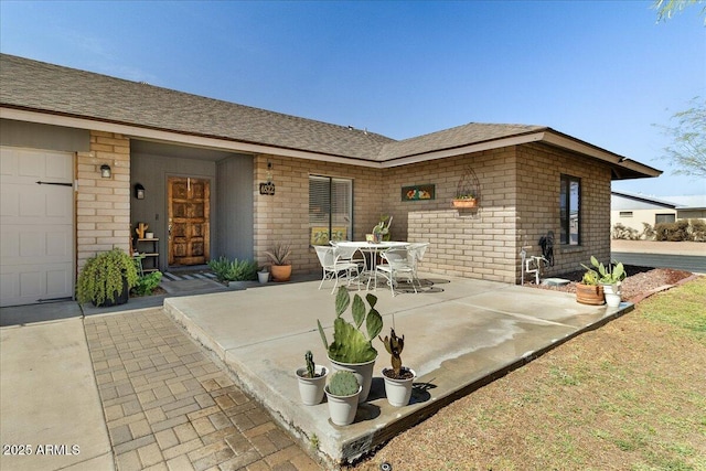 view of patio with outdoor dining space