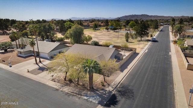 birds eye view of property with a residential view and a mountain view