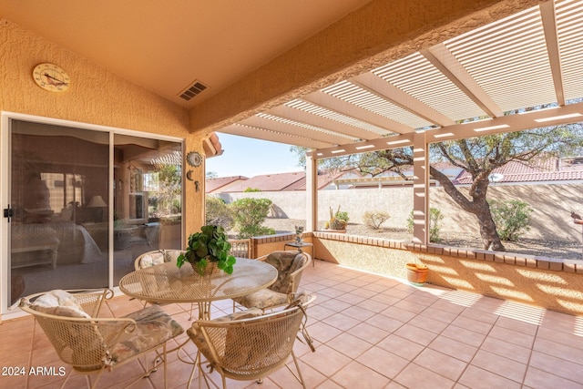 view of patio featuring a pergola