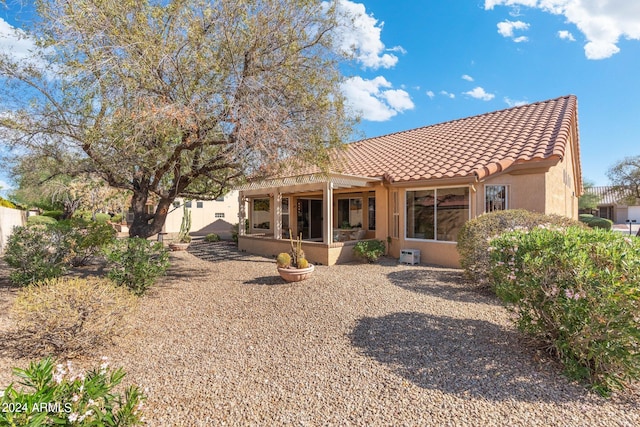 rear view of property with a patio