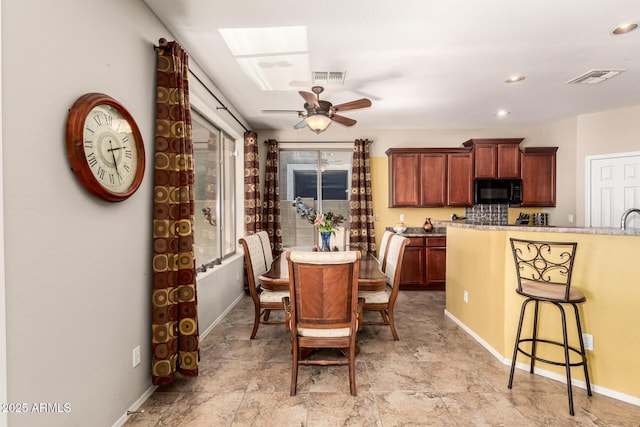 dining area featuring a ceiling fan, recessed lighting, visible vents, and baseboards