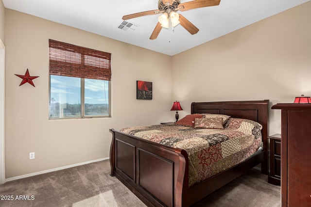 bedroom with carpet floors, a ceiling fan, visible vents, and baseboards