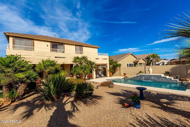 view of swimming pool featuring a patio area, a fenced backyard, and a fenced in pool