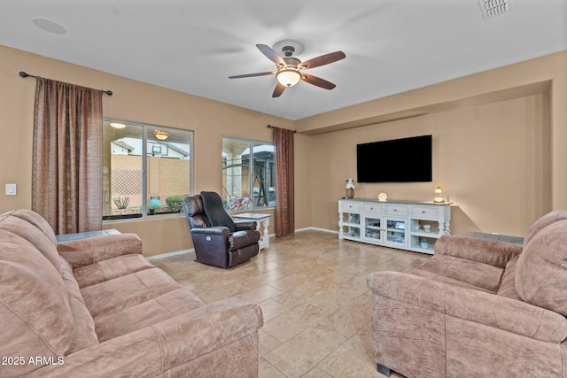 living room featuring ceiling fan