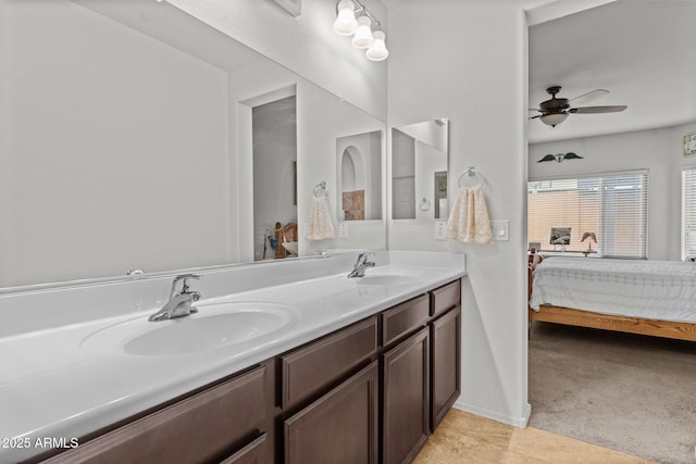 bathroom featuring vanity and ceiling fan