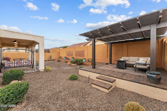 view of yard featuring a patio, an outdoor hangout area, ceiling fan, and a pergola