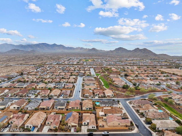 birds eye view of property featuring a mountain view