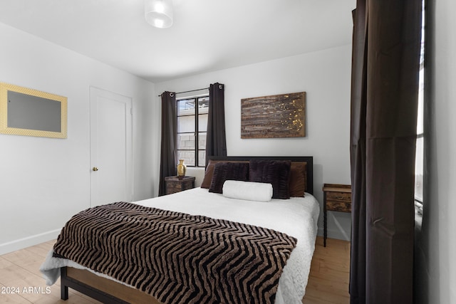 bedroom featuring light hardwood / wood-style floors