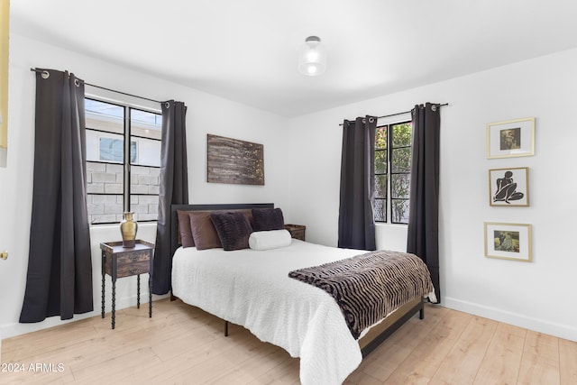 bedroom featuring light hardwood / wood-style floors