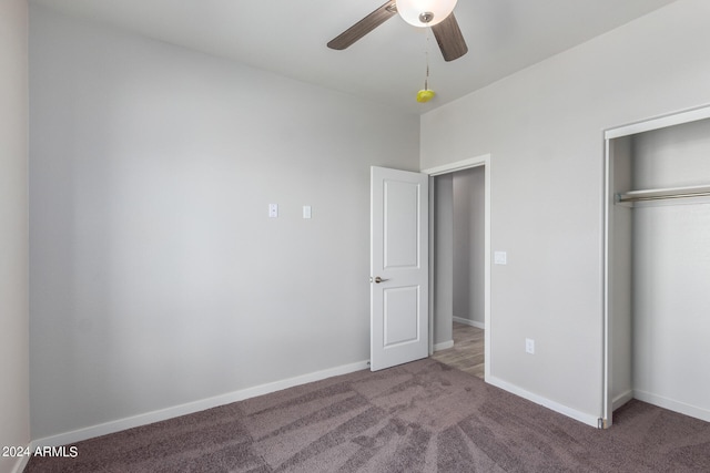 unfurnished bedroom featuring ceiling fan, carpet floors, and a closet