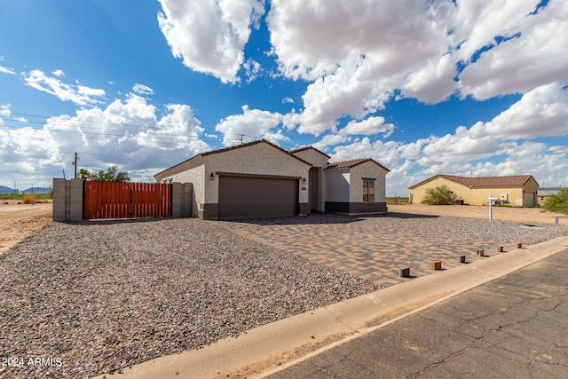 view of front of property with a garage