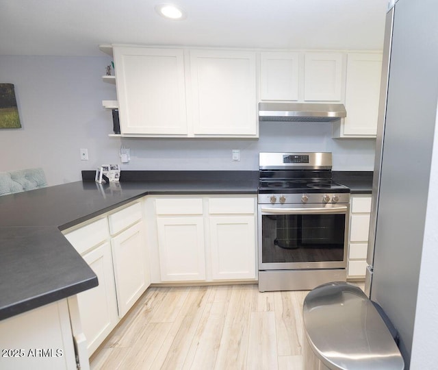 kitchen with stainless steel appliances, white cabinetry, and light wood-type flooring