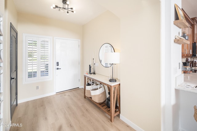 foyer entrance featuring light wood-type flooring