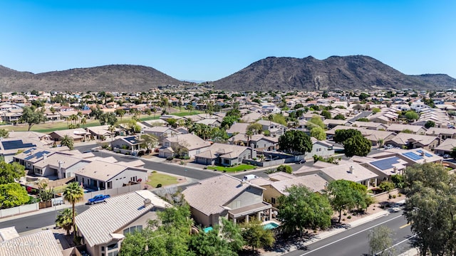 birds eye view of property featuring a residential view and a mountain view