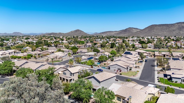 birds eye view of property featuring a mountain view and a residential view