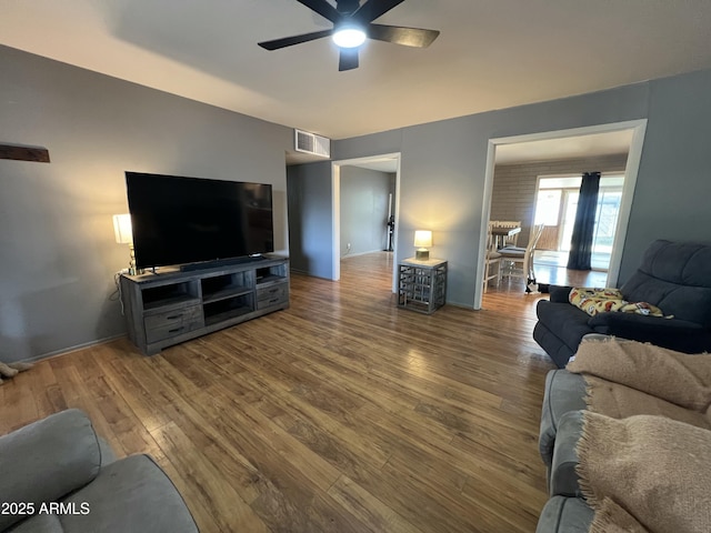 2564 Mockingbird Dr, Sierra Vista, AZ 85635 - living room with a ceiling fan and wood finished floors