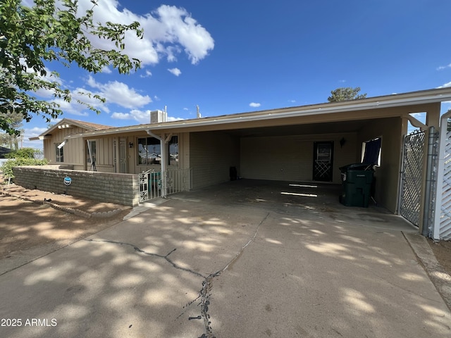 2564 Mockingbird Dr, Sierra Vista, AZ 85635 - ranch-style house featuring concrete driveway and an attached carport