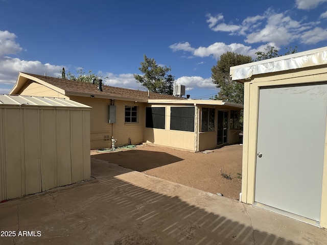 2564 Mockingbird Dr, Sierra Vista, AZ 85635 - back of property featuring a sunroom and a patio area