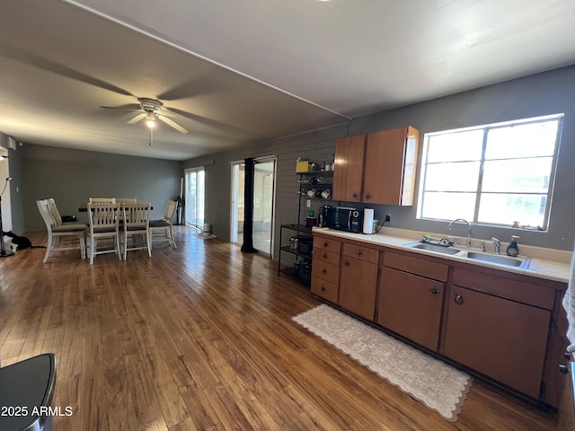 2564 Mockingbird Dr, Sierra Vista, AZ 85635 - kitchen with a sink, dark wood-style flooring, and light countertops