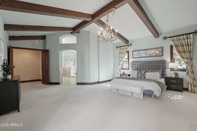 1330 N 40th St Unit 1, Mesa, AZ 85205 - bedroom featuring arched walkways, carpet flooring, a chandelier, and ensuite bath