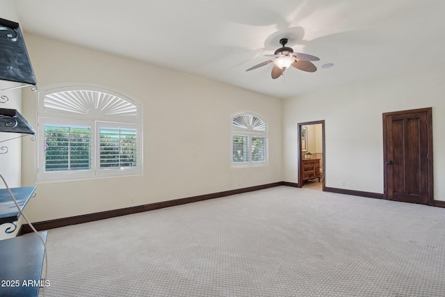 1330 N 40th St Unit 1, Mesa, AZ 85205 - unfurnished bedroom with light colored carpet, a ceiling fan, and vaulted ceiling