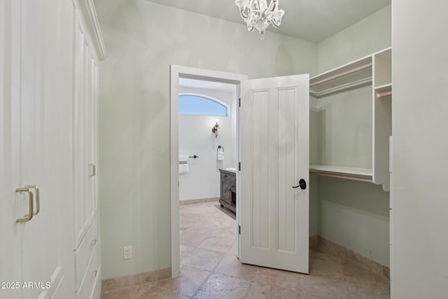 1330 N 40th St Unit 1, Mesa, AZ 85205 - walk in closet with a wood stove and a chandelier