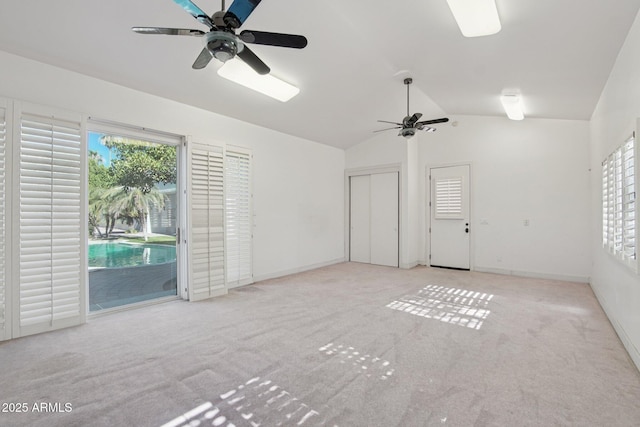 1330 N 40th St Unit 1, Mesa, AZ 85205 - unfurnished living room featuring a ceiling fan, carpet floors, and vaulted ceiling