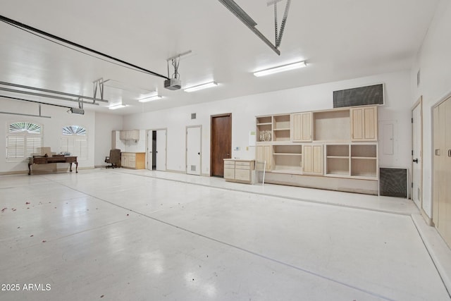 1330 N 40th St Unit 1, Mesa, AZ 85205 - garage featuring a garage door opener and electric panel