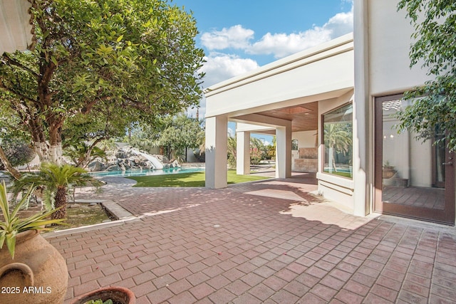 1330 N 40th St Unit 1, Mesa, AZ 85205 - view of patio / terrace featuring an outdoor pool
