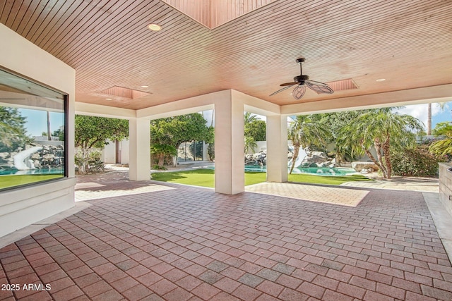 1330 N 40th St Unit 1, Mesa, AZ 85205 - view of patio / terrace with ceiling fan and a pool