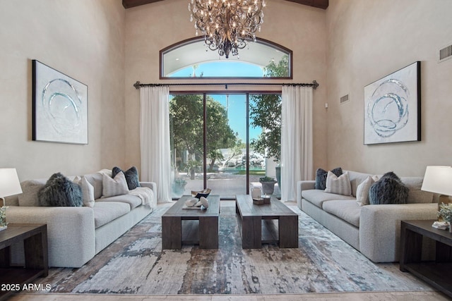 1330 N 40th St Unit 1, Mesa, AZ 85205 - living area with a high ceiling and a chandelier