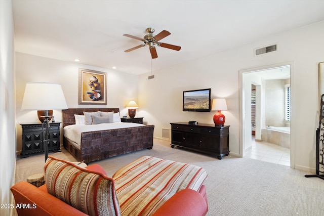 carpeted bedroom featuring recessed lighting, visible vents, and baseboards